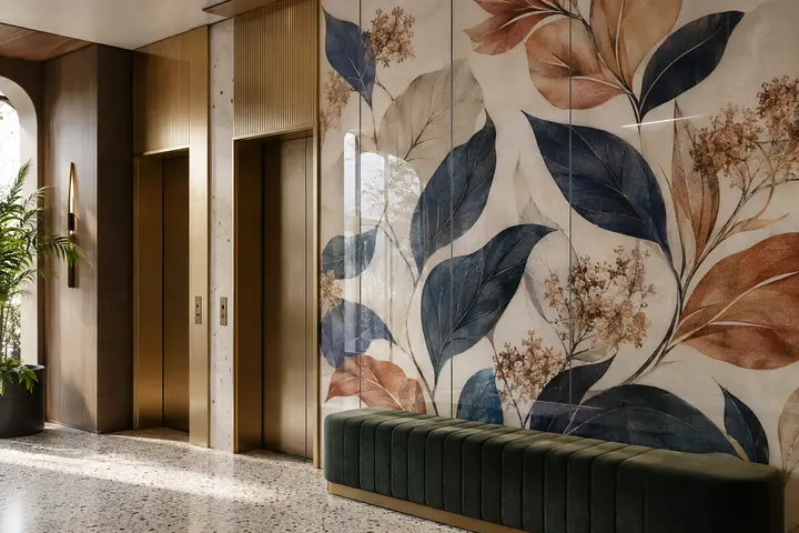Botanical ceramic-printed glass feature wall in a boutique hotel elevator lobby