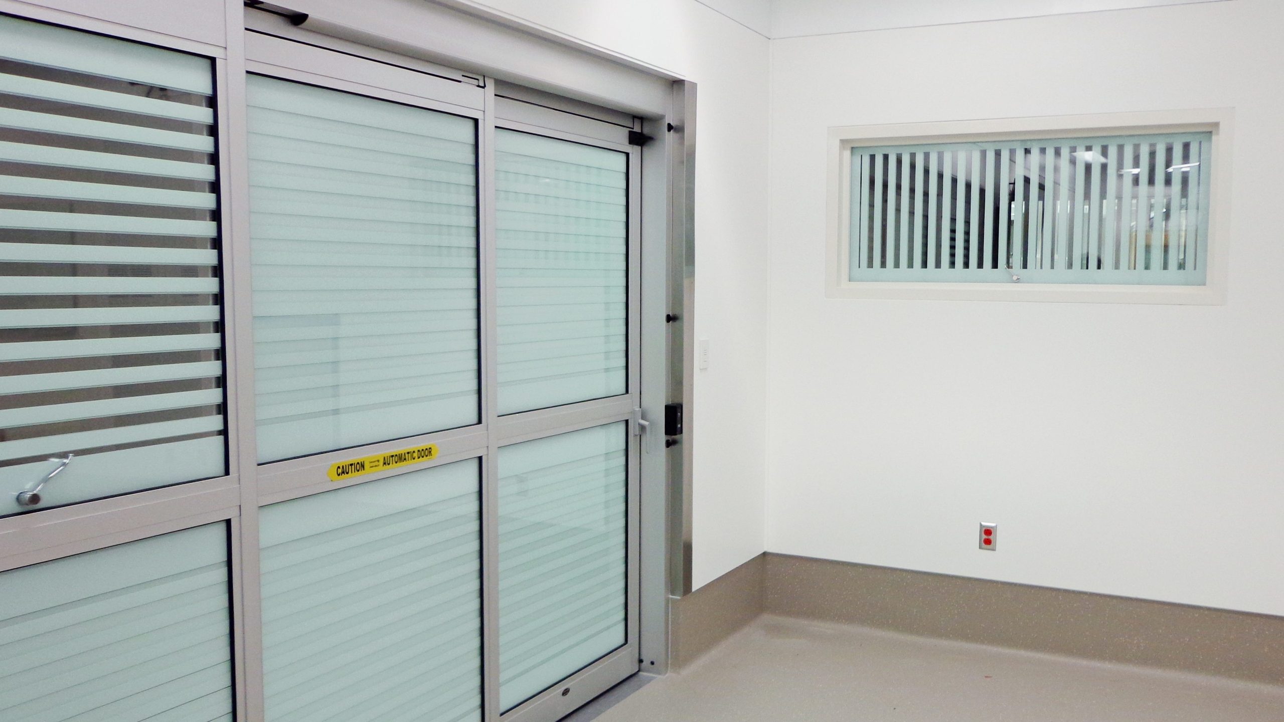 Vistamatic privacy vision panels installed in automatic operating-room doors at Reading Hospital