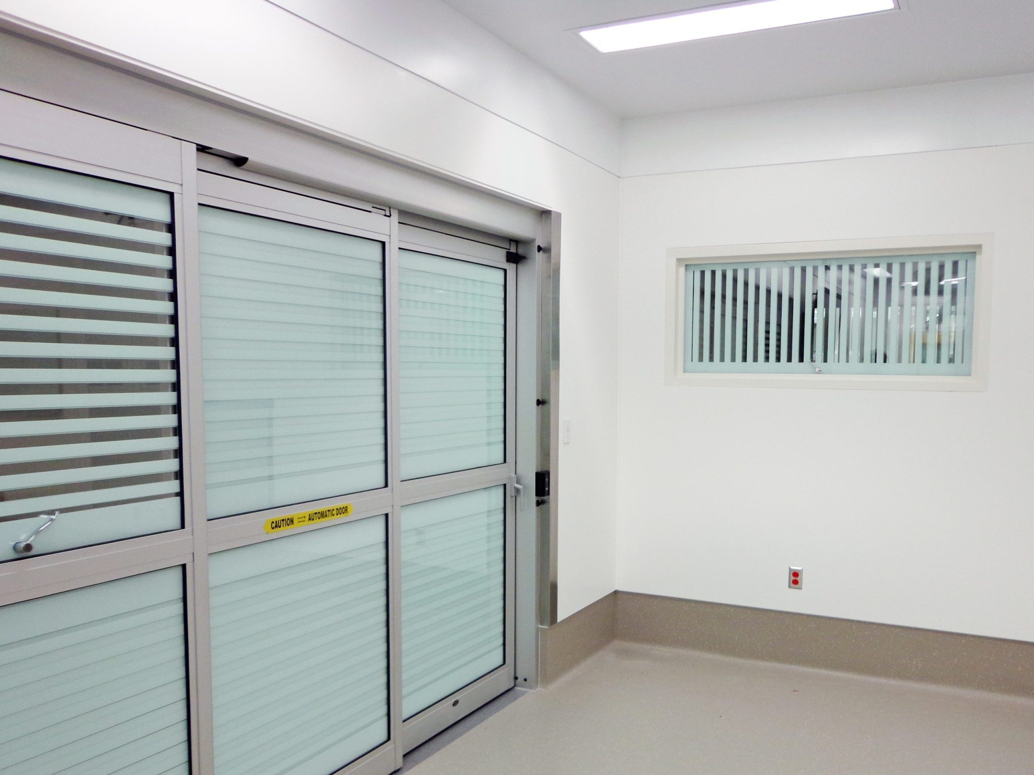 Vistamatic privacy vision panels installed in automatic operating-room doors at Reading Hospital